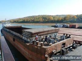 192 . Hull barge with covers